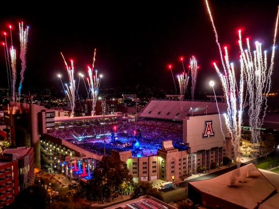 graduation fireworks over Arizona Stadium