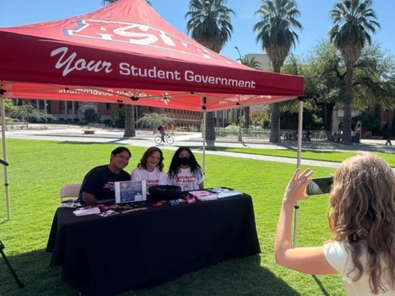 Photograph of students on the UA Mall at the ASUA tent