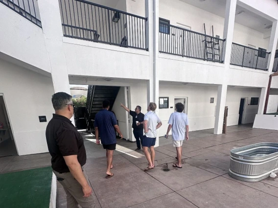 Greek Life members conduct a building walk-through with UAPD and University Risk Management Services.