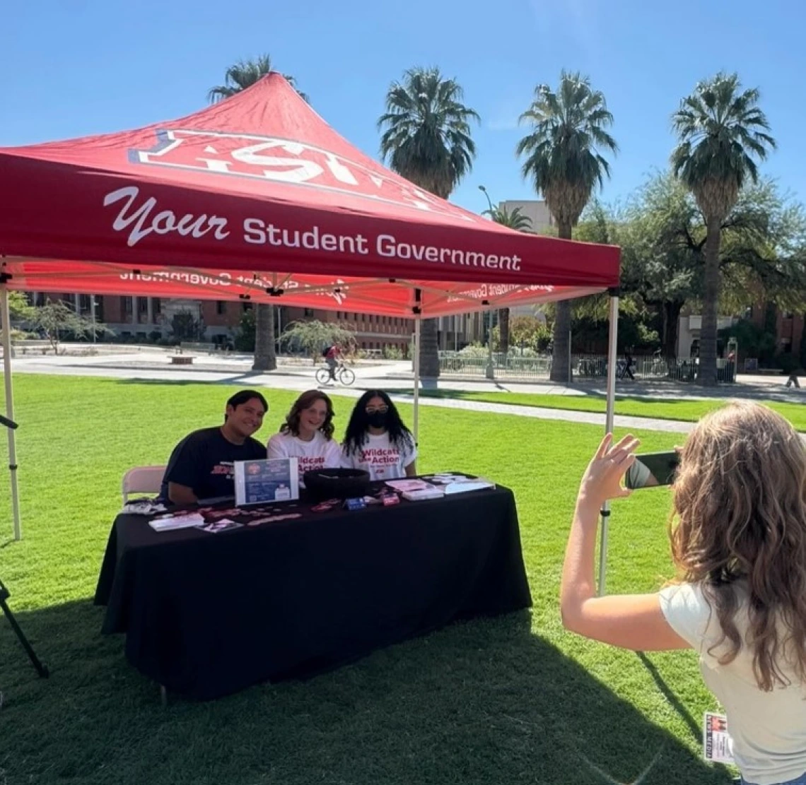 Photograph of students on the UA Mall at the ASUA tent