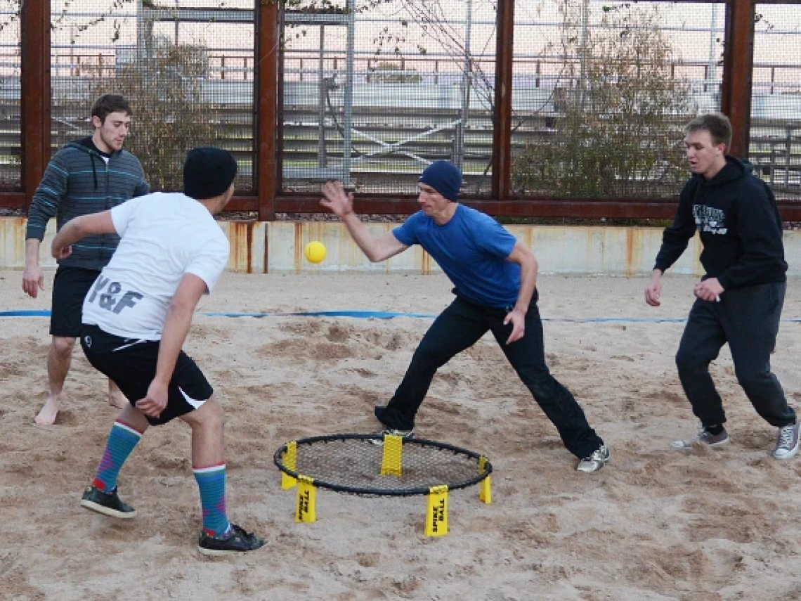 Students playing Spikeball at Campus REC