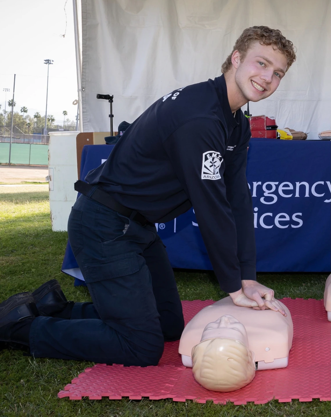 A Zeta-Psi member involved in the University's Emergency Medical Services program practices CPR on a mannequin..