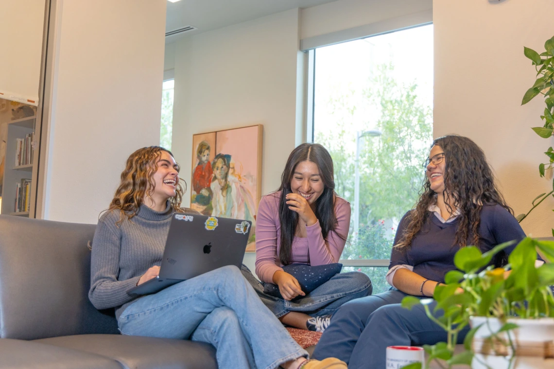 students with a laptop