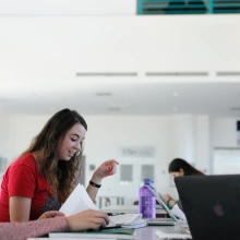 students with a laptop