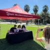 Photograph of students on the UA Mall at the ASUA tent